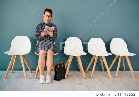 Chair, tablet and woman in waiting room for interview, job application or recruitment. Hiring, connection and female person with technology in office for opportunity, onboarding or employment 143445152