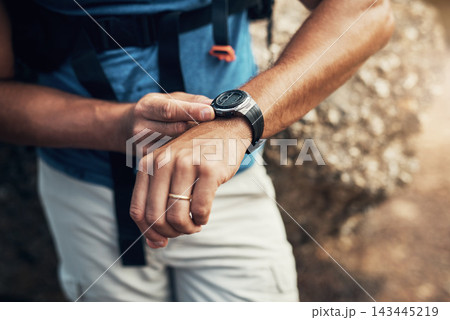 Arms, man and hiking watch in outdoors for fitness with health in mountain nature for exploration. Time, cardio and active hiker with climbing for expedition with travel, stone and trekking in Spain. Arms, man and hiking watch in outdoors for fitness with health in mountain nature for exploration. Time, cardio and active hiker with climbing for expedition with travel, stone and trekking in Spain. 143445219