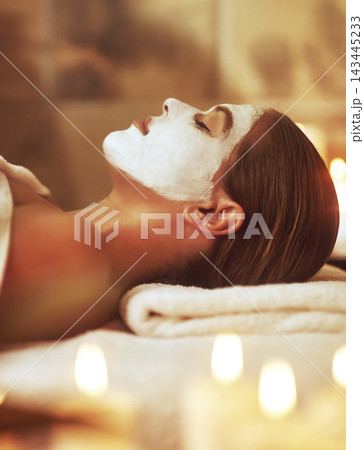 Spa, face mask and woman with beauty, candles and skincare treatment at luxury hotel. Cosmetics, sleeping and calm client with anti aging and skin care with cream and facial lotion with wellness Spa, face mask and woman with beauty, candles and skincare treatment at luxury hotel. Cosmetics, sleeping and calm client with anti aging and skin care with cream and facial lotion with wellness 143445233