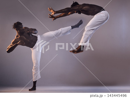 Fight, karate and black people with kick in studio for martial arts fitness, action exercise or learning. Grey background, coaching clone or athletes in training challenge, workout or double exposure 143445496