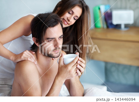 Man, woman and embrace with coffee in bed with care, bonding and wake up with greeting in home. Couple, bedroom and touch with connection, love and relax with tea cup to start morning at apartment Man, woman and embrace with coffee in bed with care, bonding and wake up with greeting in home. Couple, bedroom and touch with connection, love and relax with tea cup to start morning at apartment 143446094