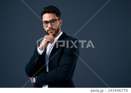 Business, investor and portrait of man in studio, dark background and thinking of stock market. Corporate, professional and Arab businessman trading in crypto or planning for investment in economy 143446770