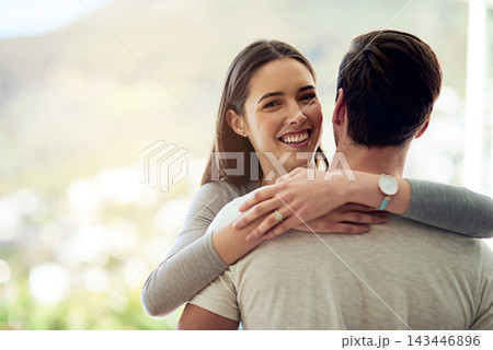 Portrait, woman and hug in home for marriage, date and together for relationship in apartment. Romance, support and partnership with happiness for love, peace and connection with man for commitment 143446896
