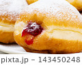 Berliners (German donuts) with raspberry jam 143450248