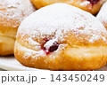 Berliners (German donuts) with raspberry jam 143450249