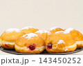 Berliners (German donuts) with raspberry jam 143450252