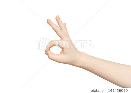 Kid hand showing OK sign isolated on white background. Close-up of positive gesture, like, agreement, accept concept Kid hand showing OK sign isolated on white background. Close-up of positive gesture, like, agreement, accept concept 143456050