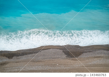 Waves breaking on the pebble beach of Qingshui Cliff in Hualien Waves breaking on the pebble beach of Qingshui Cliff in Hualien 143460763
