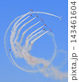 The Canadian Air Force Snowbirds jets team performing acrobatic figures on a blue sky 143461604