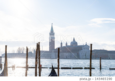 Venetian Lagoon view with gondoles Venetian Lagoon view with gondoles 143465190