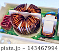 Copper coil components inside an electronic device 143467994
