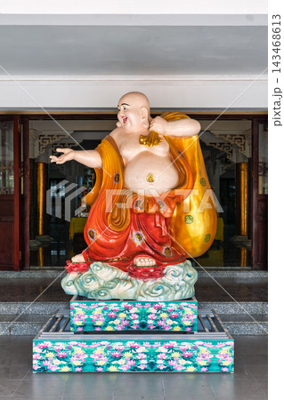 Colorful Laughing Buddha statue at Phap Lam Pagoda in Da Nang Vietnam Colorful Laughing Buddha statue at Phap Lam Pagoda in Da Nang Vietnam 143468613