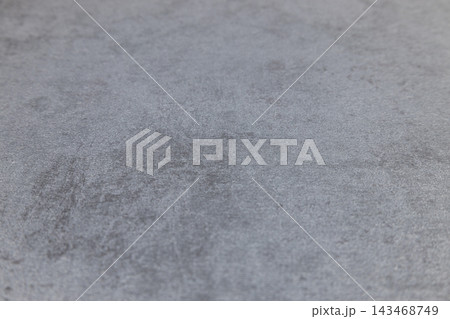 Gray stone surface background with subtle speckled pattern Gray stone surface background with subtle speckled pattern 143468749