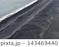 Endless black sand expanse at Reynisfjara Beach Iceland 143469440