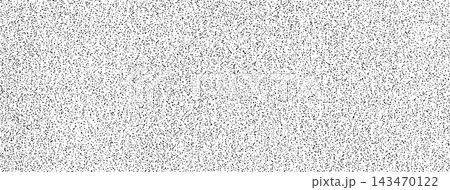 Abstract stipple background with scattered black dots on a white surface. Grain texture for design Abstract stipple background with scattered black dots on a white surface. Grain texture for design 143470122