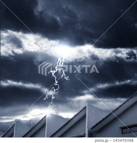 Dramatic thunderstorm with lightning striking over residential rooftops during a heavy downpour, capturing a powerful and ominous weather scene. Storm or bad weather background Dramatic thunderstorm with lightning striking over residential rooftops during a heavy downpour, capturing a powerful and ominous weather scene. Storm or bad weather background 143470398