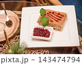 Tart honey cake Medovik sweet dessert, pastry on white plate on table restaurant 143474794