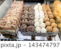 Cake bakery on counter of store, street food desserts sold at festival food 143474797