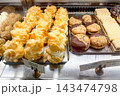 Cake bakery on counter of store, street food desserts sold at festival food 143474798