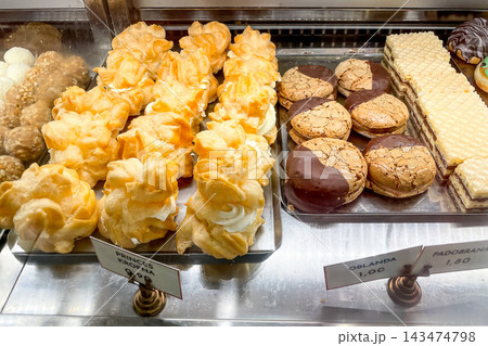 Cake bakery on counter of store, street food desserts sold at festival food Cake bakery on counter of store, street food desserts sold at festival food 143474798
