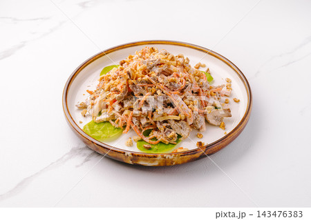 Beef, mushroom and carrot salad with walnuts Beef, mushroom and carrot salad with walnuts 143476383