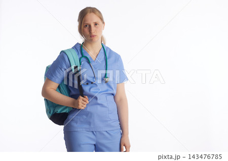 Tired Medical Student Facing Academic Stress and Long Shifts Tired Medical Student Facing Academic Stress and Long Shifts 143476785