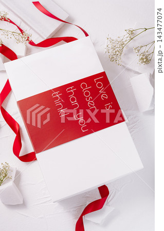 White gift box with love is closer than you think text 143477074