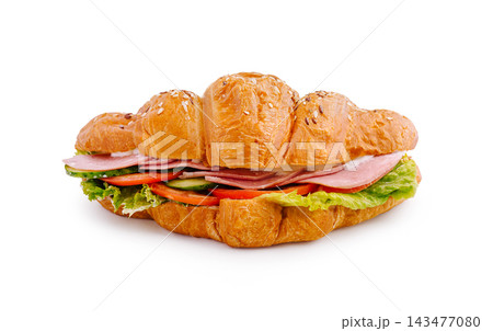 Croissant sandwich with ham, lettuce, cucumber, tomato 143477080