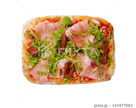 Pinsa with prosciutto, arugula, sun-dried tomatoes on white background Pinsa with prosciutto, arugula, sun-dried tomatoes on white background 143477082