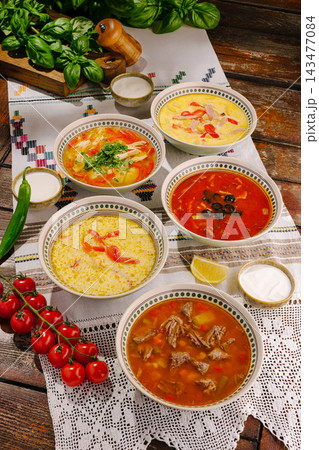 Romanian sour traditional soups with basil, pepper, tomato Romanian sour traditional soups with basil, pepper, tomato 143477084