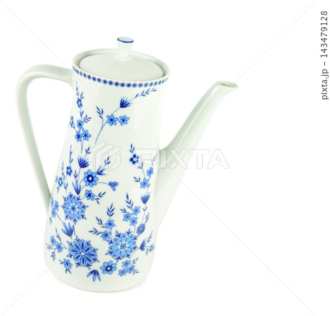 Vintage porcelain teapot with blue floral ornament isolated on white background square studio photo offering generous right copy space 143479128