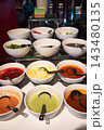 Colorful Sauce and Condiment Buffet Display 143480135