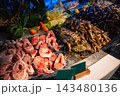 Fresh Seafood and Fish at a Vibrant Market Stall 143480136