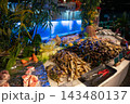 Fresh Seafood and Fish at a Vibrant Market Stall 143480137