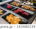 Fresh Raw Seafood Selection Displayed on Chilled Ice 143480139