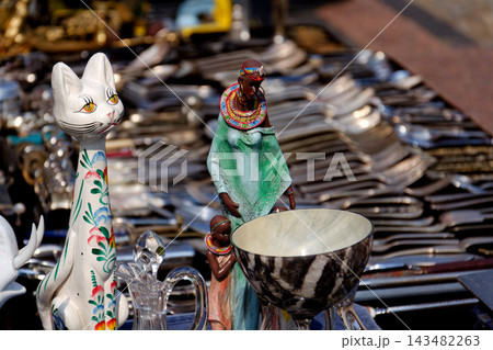 Old vintage things on the street flea market on square in front of the Cathedral of St. Mary Magdalene in Wroclav, Poland 143482263