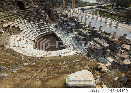 Partially reconstructed Odeon and columns of State Agora in Ephesus, Turkey Partially reconstructed Odeon and columns of State Agora in Ephesus, Turkey 143484169