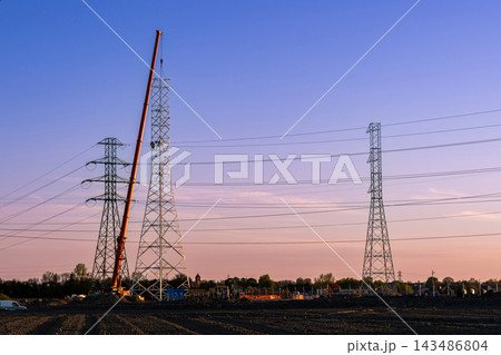 Lattice Pylon Assembly with Heavy Crane Equipment Lattice Pylon Assembly with Heavy Crane Equipment 143486804