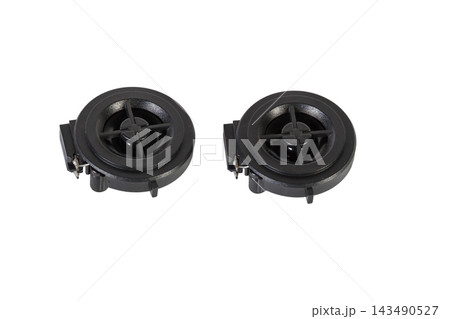 Tweeter speaker of an acoustic system - an audio for playing music in a car interior on a white isolated background in a photo studio. Spare parts for auto repair in a workshop or for sale for tuning 143490527