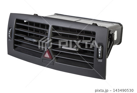 A close-up view of a part of the interior of a modern car with a view of the central ventilation deflector of the heater the passenger compartment. Used auto part catalog from junkyard. 143490530