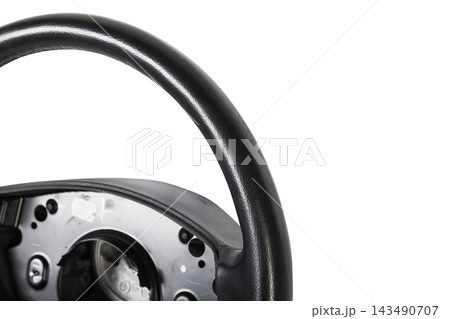 Steering wheel for car and truck isolated on white background. Automobile vehicle part or equipment. Round modern style consist of black leather and aluminum. For driver to driving control and tuning. Steering wheel for car and truck isolated on white background. Automobile vehicle part or equipment. Round modern style consist of black leather and aluminum. For driver to driving control and tuning. 143490707