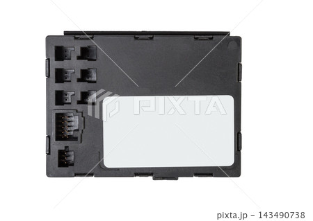 A plastic car engine control unit with metal elements on a white isolated background is the connecting center of various subsystems, units and assemblies. Spare part for repair in a auto service A plastic car engine control unit with metal elements on a white isolated background is the connecting center of various subsystems, units and assemblies. Spare part for repair in a auto service 143490738
