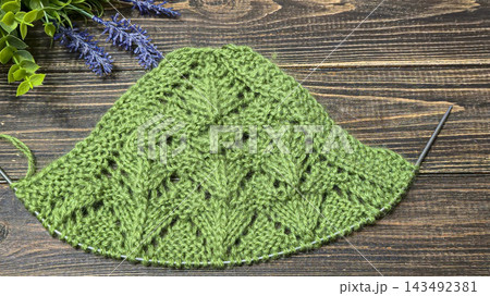 Multicolored hand-knitted fabric. Knitting and crochet lessons. Fashion 143492381