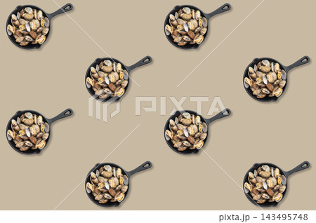 Black skillets filled with open clams repeated in diagonal rows across a pale beige decorative seafood background 143495748