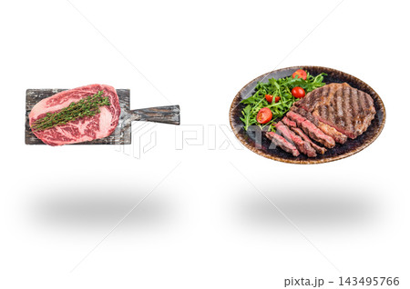 Raw ribeye on a wooden board beside grilled beef with salad on a platter floating above shadows on white Raw ribeye on a wooden board beside grilled beef with salad on a platter floating above shadows on white 143495766