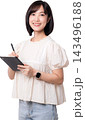 Happy asian woman holding digital tablet preparing project about artificial intelligence and modern technology concept isolated on clear transparency background studio shot 143496188