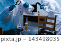 Forensic expert collecting a blood sample at a crime scene for laboratory analysis, DNA testing, criminal investigation, evidence examination, and justice. 143498035