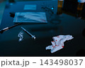 Forensic expert collecting a blood sample at a crime scene for laboratory analysis, DNA testing, criminal investigation, evidence examination, and justice. 143498037