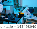 Forensic expert collecting a blood sample at a crime scene for laboratory analysis, DNA testing, criminal investigation, evidence examination, and justice. 143498040