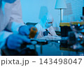 Forensic expert collecting a blood sample at a crime scene for laboratory analysis, DNA testing, criminal investigation, evidence examination, and justice. 143498047